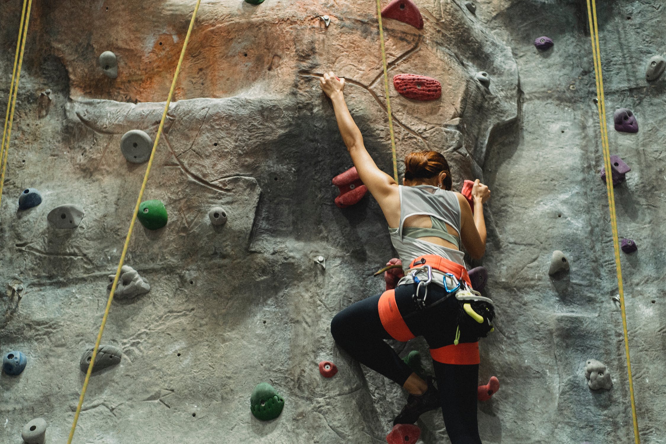 partaking in rock climbing activities hobby